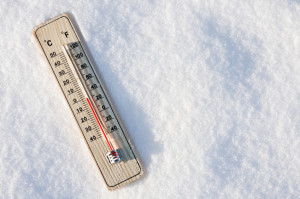 thermometer in the snow with zero temperature